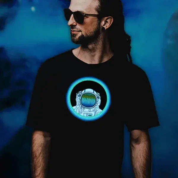 Man wearing sunglasses and an astronaut equalizer light up shirt that animates to sound and music