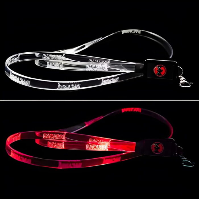 Diagram showing clear LED Lanyard turned off with Bacardi logo laser engraved, with the same lanyard pictured below turned on glowing bright red