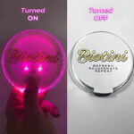 Biotini custom branded LED coaster shown on and off side by side