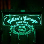 Gillen's Garage custom designed bar neon sign on acrylic glowing green