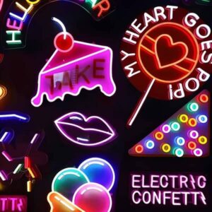 Wall of custom neon signs in bright colors with cake lips ice cream confetti sprinkles