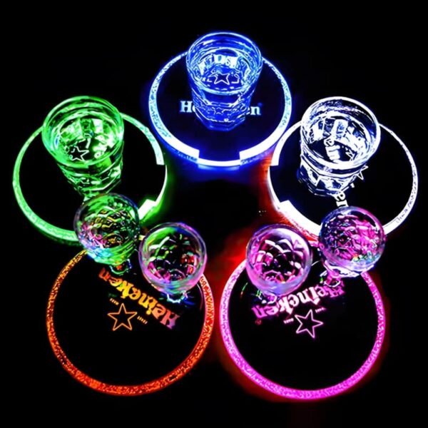circle of 5 Heineken custom led coasters each lighting up different neon colors