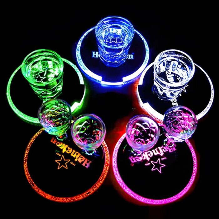 circle of 5 Heineken custom led coasters each lighting up different neon colors