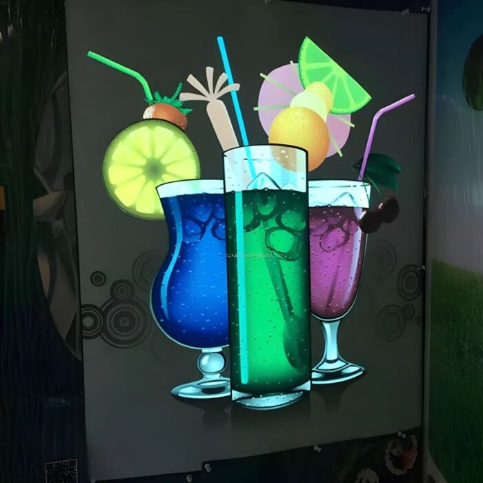 Picture of tropical beverages lighting up on el poster