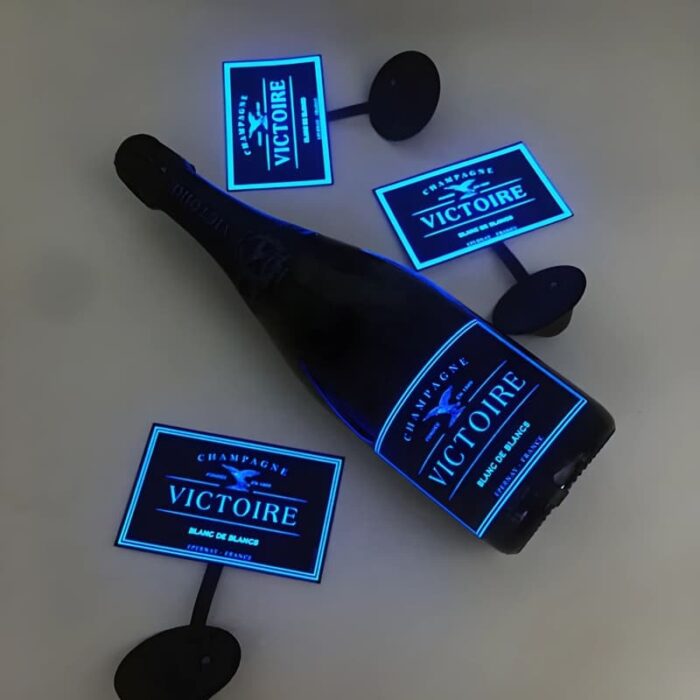Light up wine label on champagne bottle with other extra EL panels surrounding the bottle