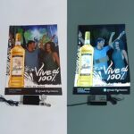 Side by side showing a liquor poster advertisement