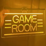 Acrylic LED edge lit sign with 'Game Room' custom design illuminating yellow