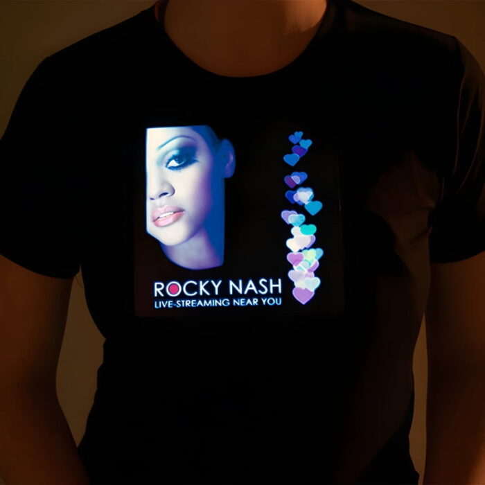 A woman wearing a light-up t-shirt promoting her influencer brand.
