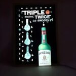Jameson liquor illuminated poster lighting up brightly