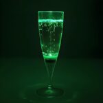 Green LED champagne flute lighting up bright green