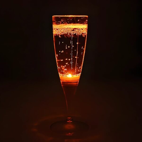 Orange LED champagne flute lighting up bright orange