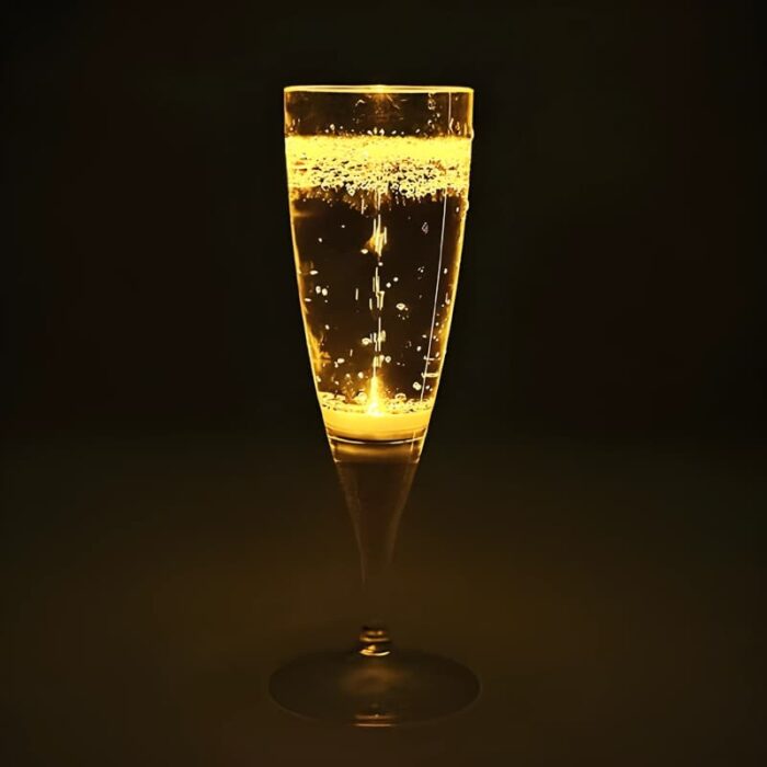 LED champagne glass lighting up bright yellow
