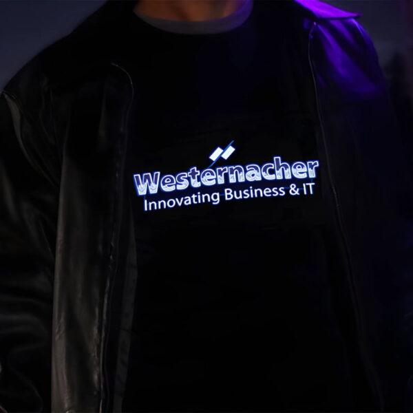 Close up of light up shirt for IT company lighting up like an equalizer under leather jacket