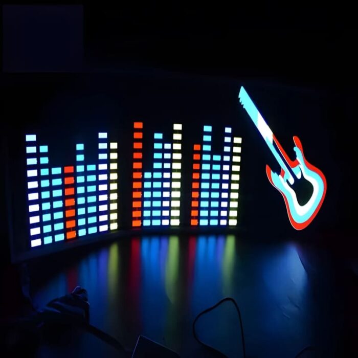 Music equalizer guitar design lighting up in dark room