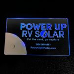 Power Up RV Solar laser engraved LED business card lighting up bright blue