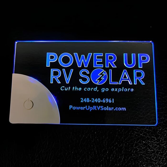 Power Up RV Solar laser engraved LED business card lighting up bright blue