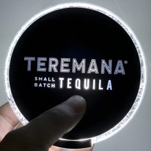 Tequila company branded LED coaster lighting up bright white