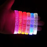 Six LED bracelets on hand all lighting up different color