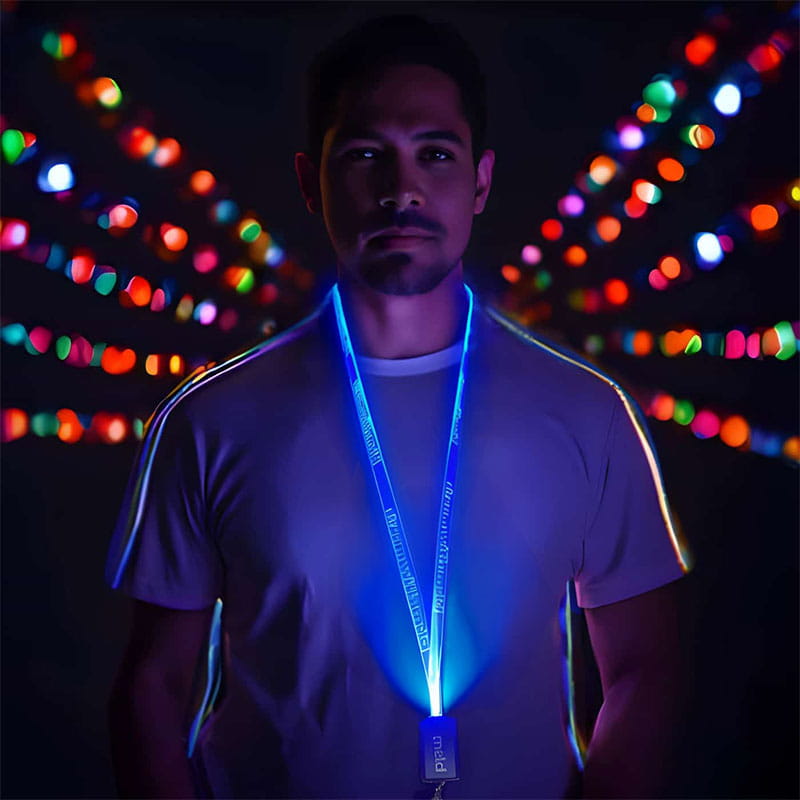Man wearing custom engraved led lanyard glowing neon blue