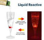 LED champagne flute with liquid being poured, illuminating the glass as it reacts to the light.
