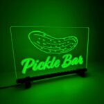 Acrylic light-up sign featuring the phrase "Pickle Bar" in green LED's