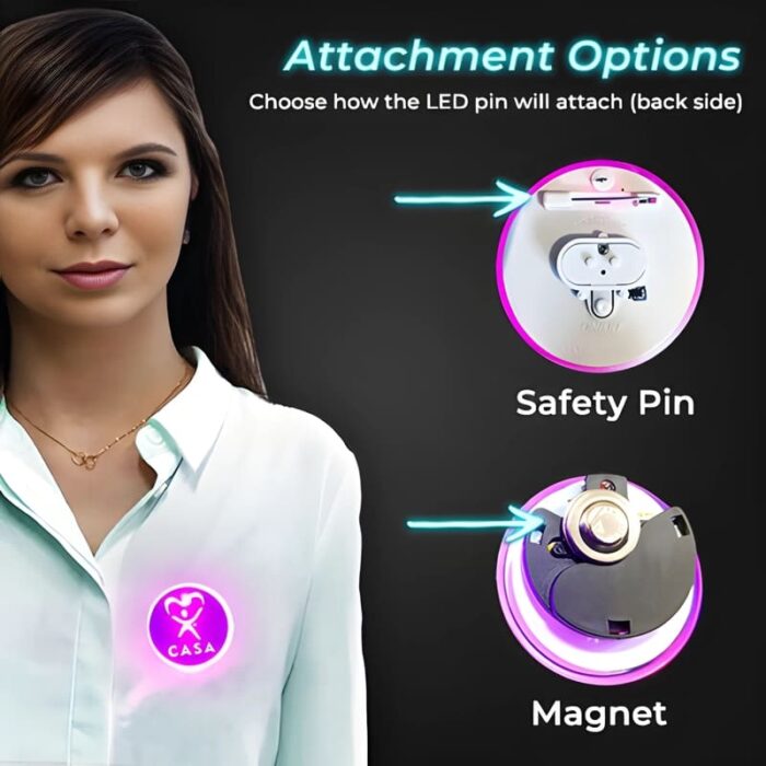 Woman wearing glowing pink LED pin, showing two different ways the pin can attach: safety pin or magnet