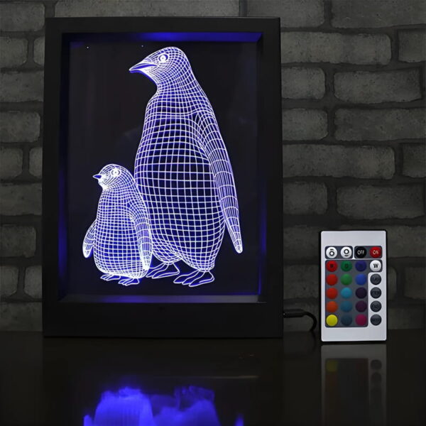 A black-framed LED sign featuring a 3D engraved penguin