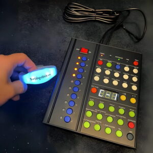 Customized LED bracelet next to 10 zone remote controller