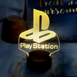 playstation logo engraved on edge lit sign glowing yellow