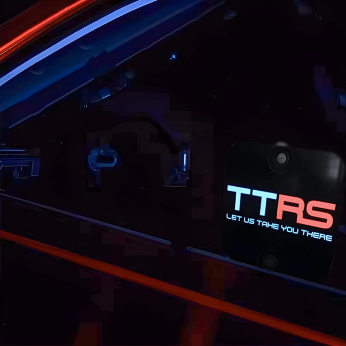 TT ride share logo glowing on el car sticker window
