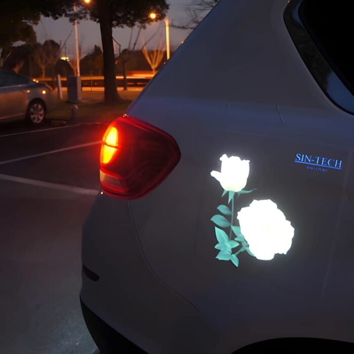 bright glowing LED rose decal adhered to car