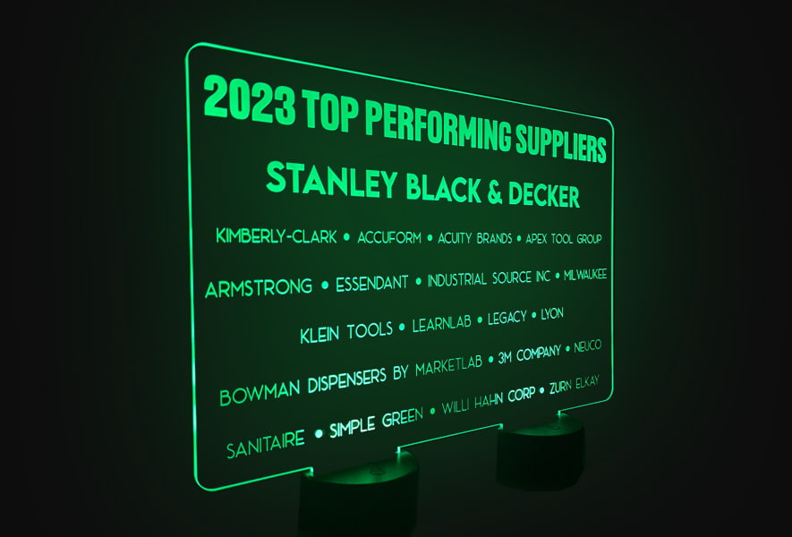 LED acrylic sign displaying "Top Performing Suppliers," designed with etching and illuminated by double LED pucks