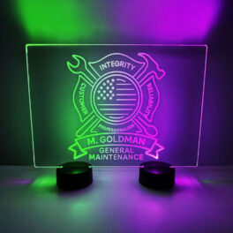 Bright acrylic LED sign that says "Mr. Goldman Maintenance," designed with custom LED acrylic and engraving