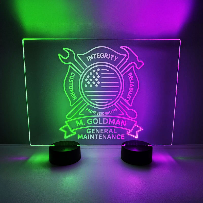 Bright acrylic LED sign that says "Mr. Goldman Maintenance," designed with custom LED acrylic and engraving