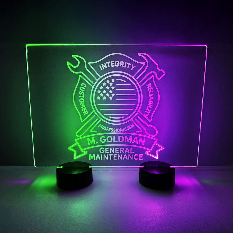 Bright acrylic LED sign that says "Mr. Goldman Maintenance," designed with custom LED acrylic and engraving