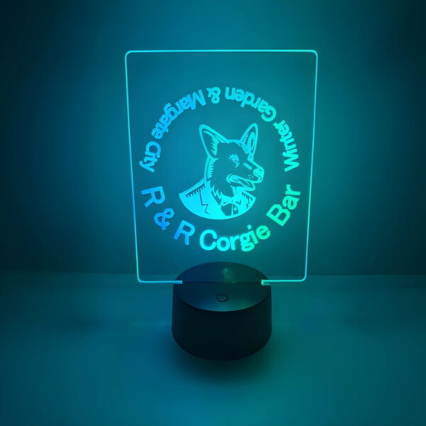Battery powered glowing table lamp green and blue with dog logo