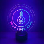 Customized light up table lamp in a circle shape with multiple colored LED bases