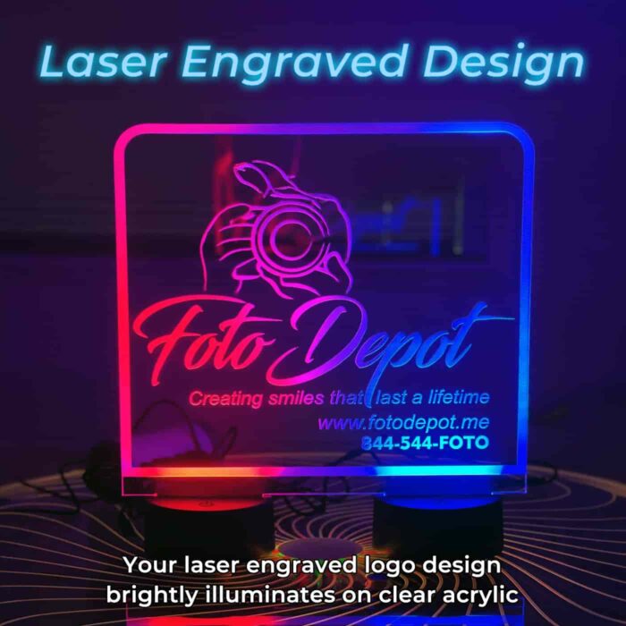 Laser-engraved branding on a lighted display sign, showcasing the etched design and illuminated effects