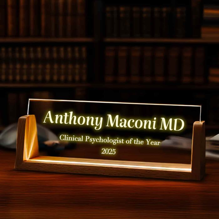 Warmly glowing desk lamp with "Clinical Psychologist of the Year" engraving, elegantly displayed on a table