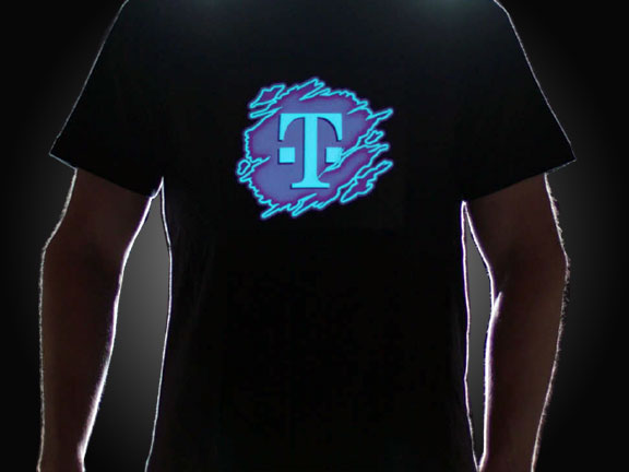 Guy wearing T-Mobile Logo on LED shirt lighting up in dark setting