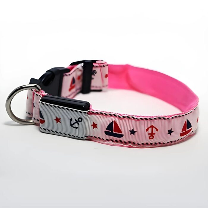 White and Pink LED Dog Collar Turned Off in white setting with anchors and sailboats printed on collar